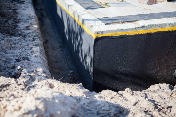 Professional Exterior Waterproofing technician working in Chase, MI